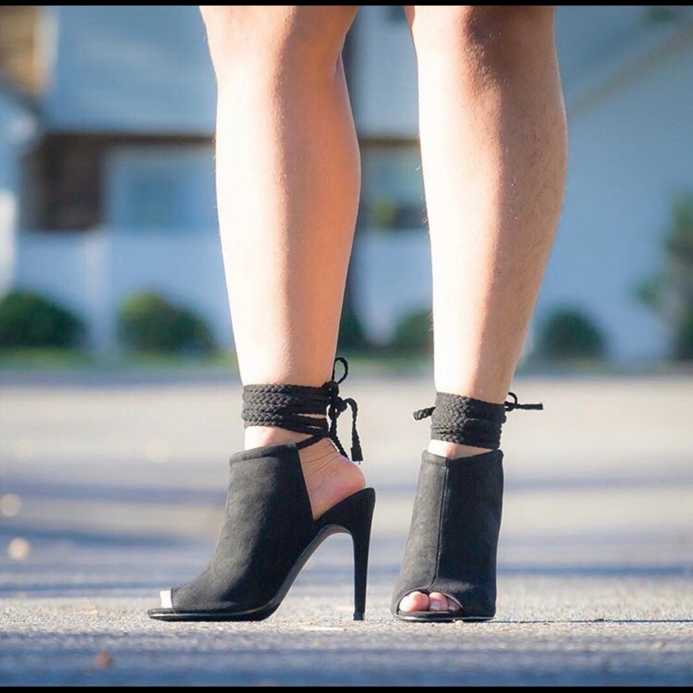 Black tie up heels in perfect condition.